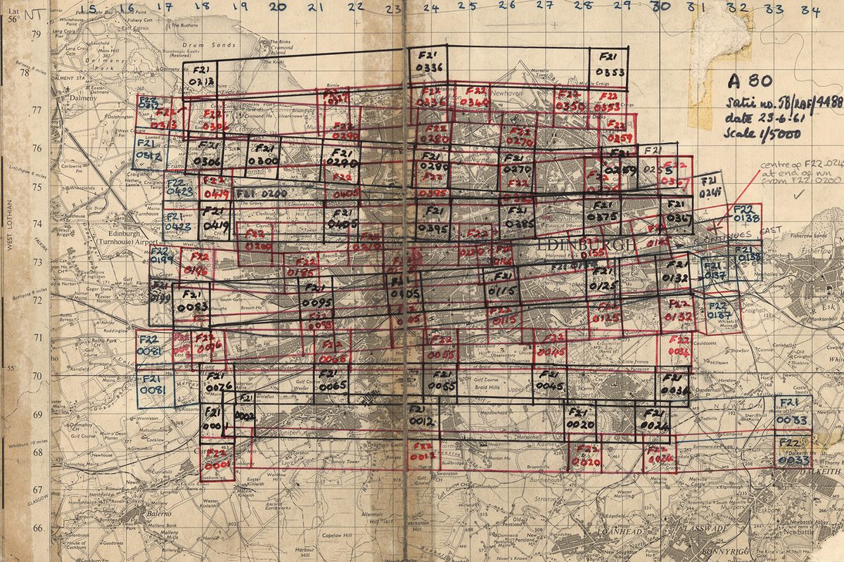 A monochrome map of the city of Edinburgh. Lines and numbers in alternating black and red pen show where an aircraft has taken aerial photos.