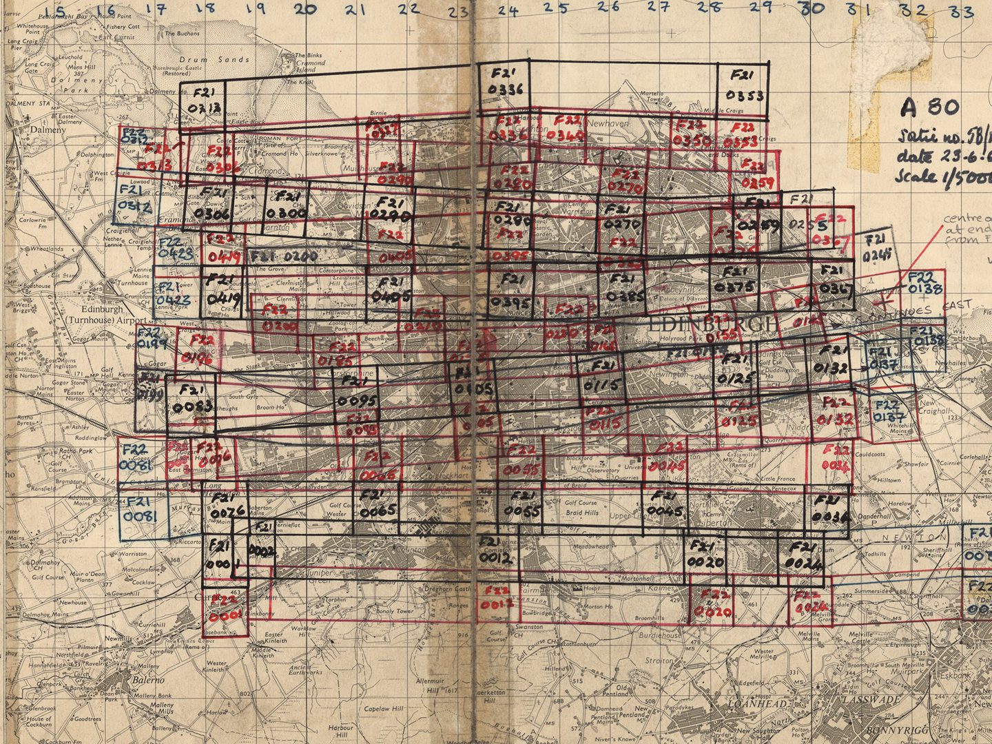 A monochrome map of the city of Edinburgh. Lines and numbers in alternating black and red pen show where an aircraft has taken aerial photos.