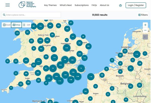 A screenshot of a digital map of England, Wales, France, Belgium and the Netherlands, indicating 91,683 photos available. There are numerous blue numbered dots showing where each photo is and how many are in each location.